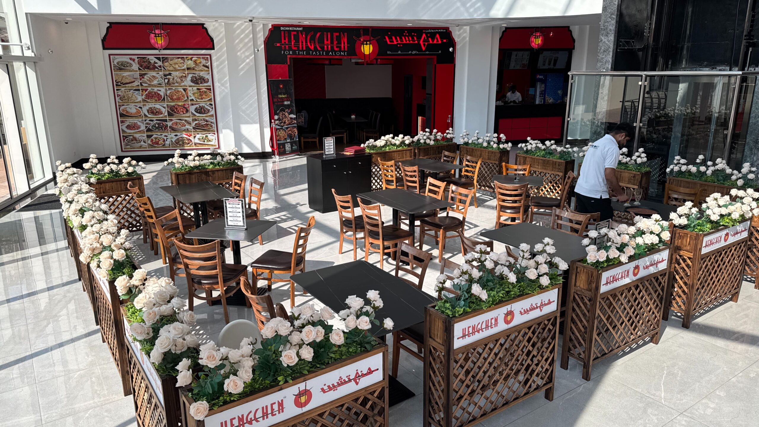 Hengchen storefront and covered terrace seating at The Market Mall, Dubai Investment Park